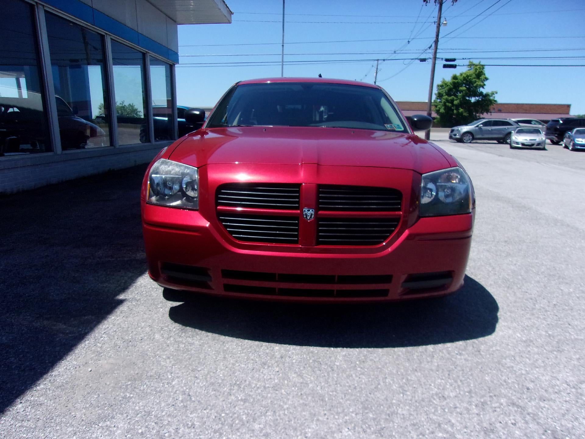 2005 Dodge Magnum SE in Inferno Red Crystal Pearl — front three-quarter view