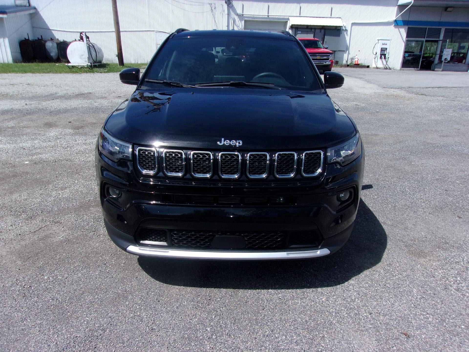 2024 Jeep Compass Limited 4x4 in Diamond Black Crystal Pearlcoat — front three-quarter view