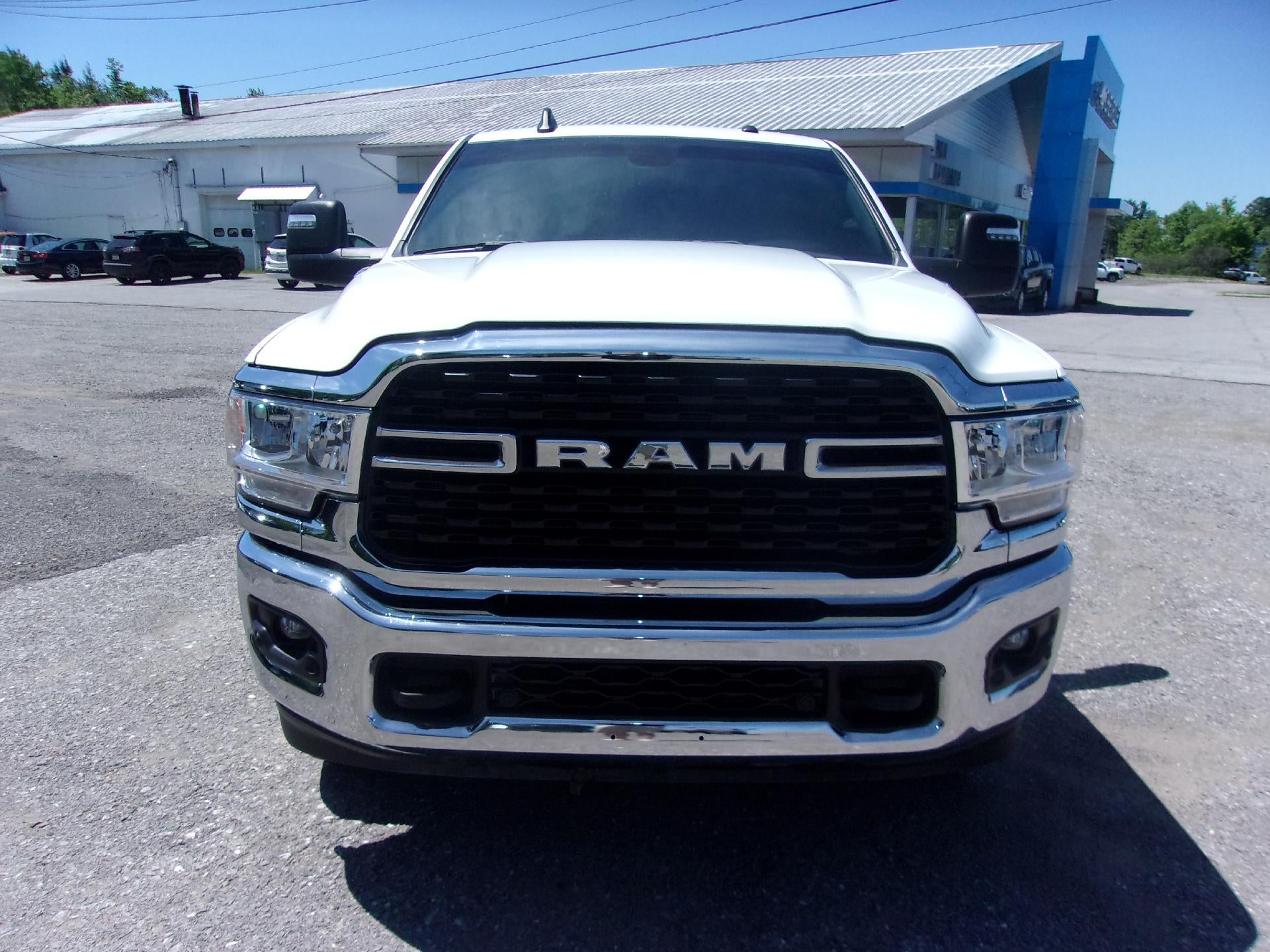 2024 RAM 2500 Lone Star 4x4 Crew Cab 6'4" Box in Bright White Clearcoat — front three-quarter view